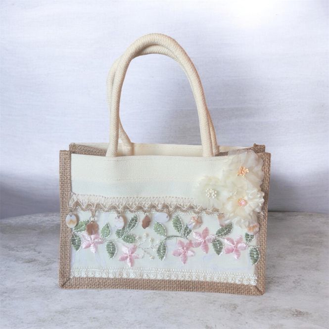 Hovedbilde Varsha's  Veske Blomster
